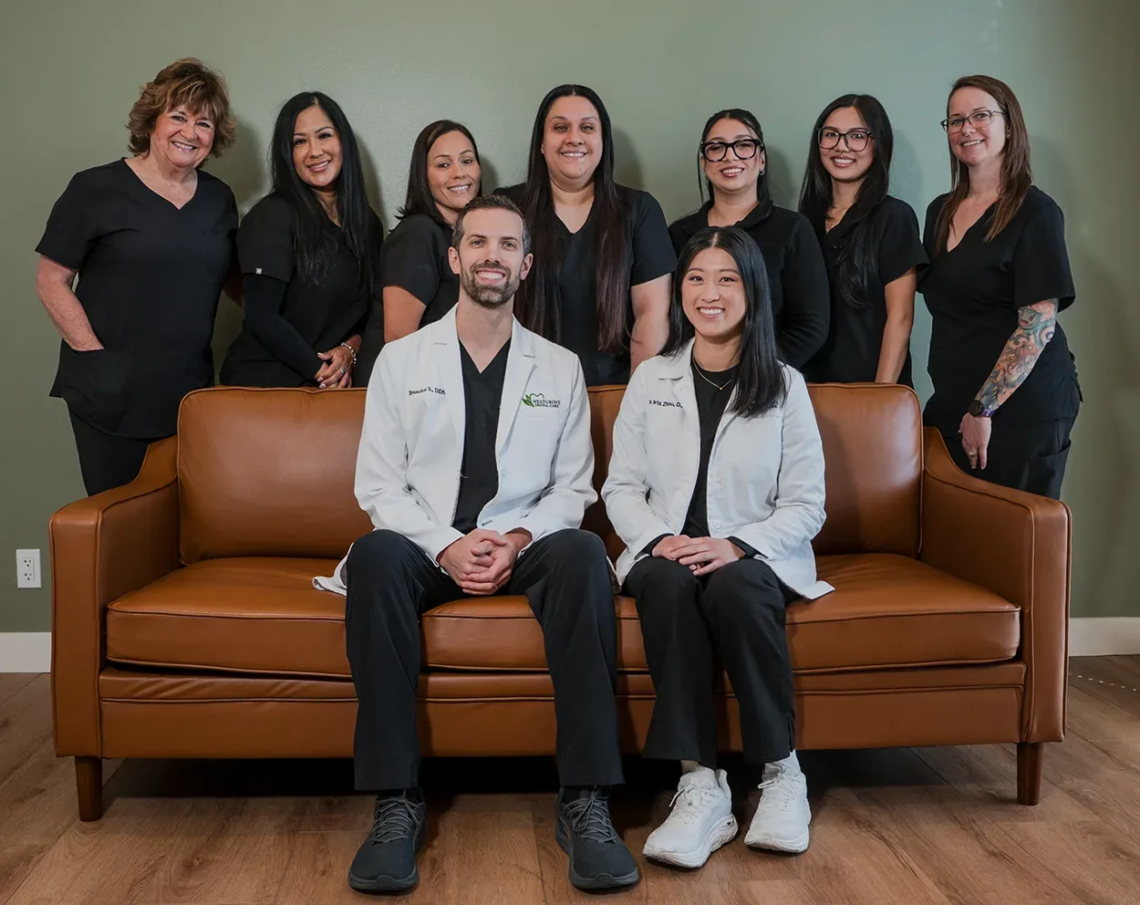 Drs. Brandon and Iris Skenandore with the Westgrove Dental Care team